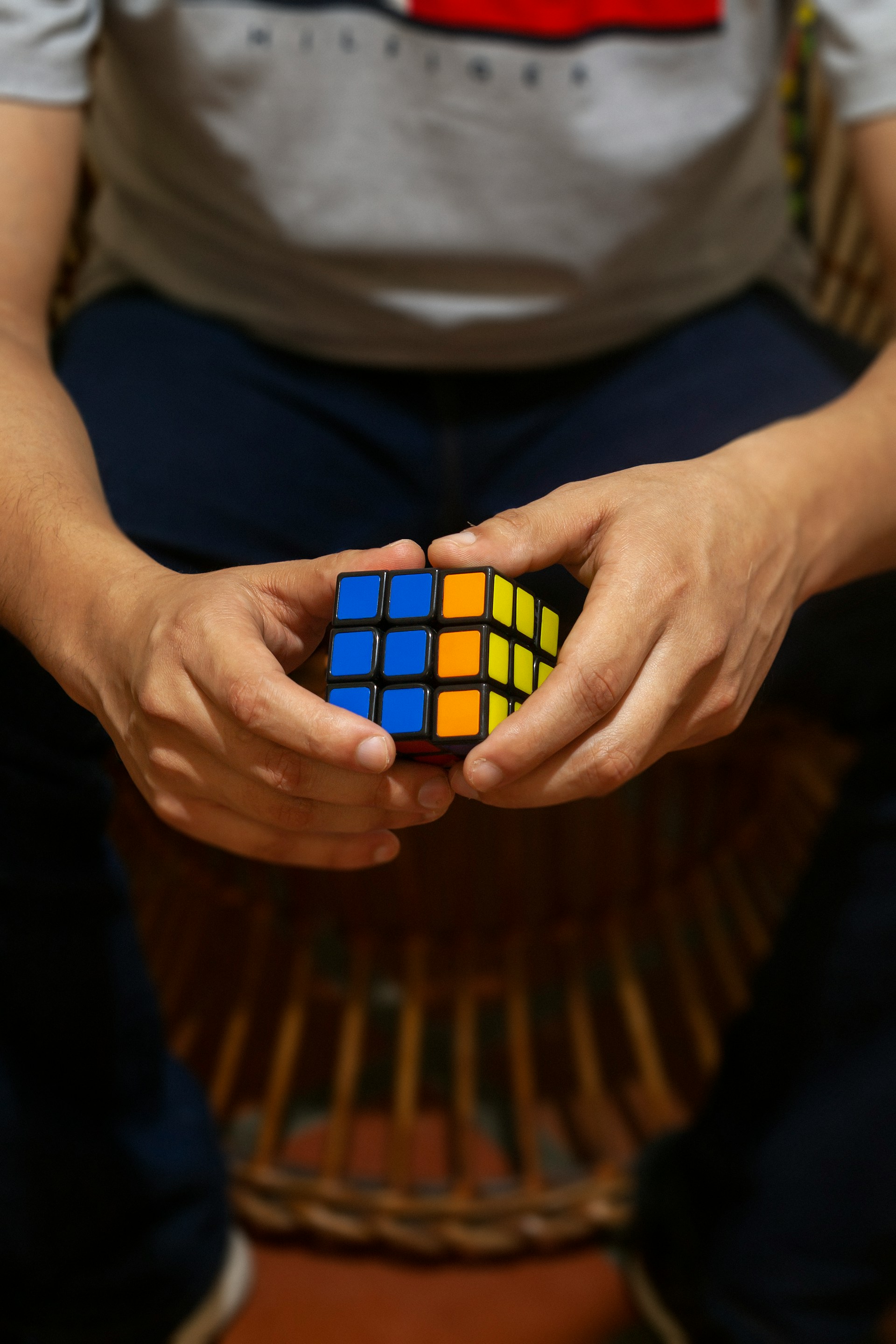 A person intensely focused on a challenging puzzle game.